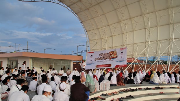 Muslim citizens gathering together to pray together photo