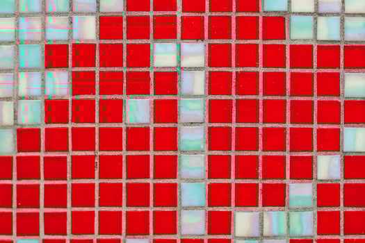 Texture of red mosaic tiles, close-up photo