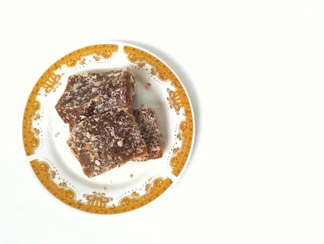 Ongol Ongol, Indonesian Traditional Snacks, made from Arrowroot Flour and Brown Sugar, on white background photo