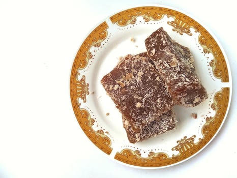 Ongol Ongol, Indonesian Traditional Snacks, made from Arrowroot Flour and Brown Sugar, on white background photo