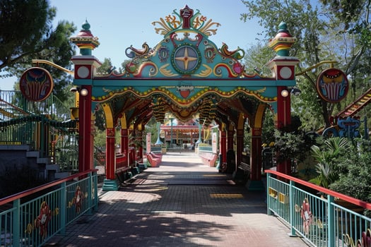 Colorful amusement park entrance archway photo