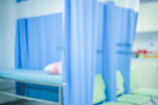 Interior of doctor office as creative abstract blur background. Inside the modern clinic room. photo