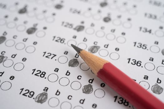 Answer sheets with pencil drawing fill to select choice, education concept. photo