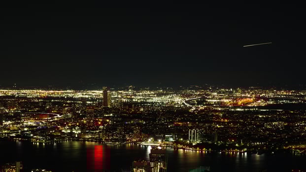 The New York city night view with the lights on in the skyscrapers at night photo