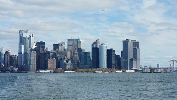 The New York manhattan view from the ferry boat in the sunny day photo