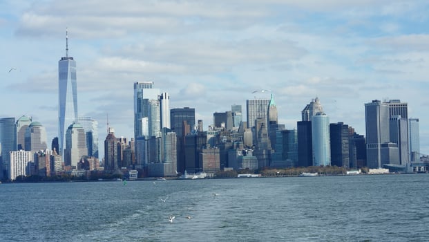 The New York manhattan view from the ferry boat in the sunny day photo
