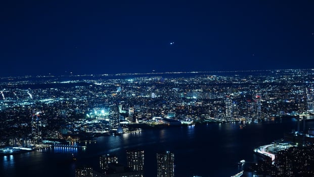 The New York city night view with the lights on in the skyscrapers at night photo