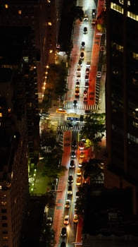 The New York city night view with the lights on in the skyscrapers at night photo