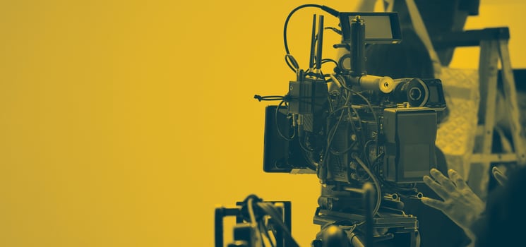 Film director and crew making commercial content advertising in studio. photo