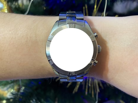 A view of the quartz watch dial with a stainless steel strap on the arm with a mockup photo