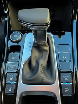 The interior of a new car. Automatic transmission in leather trim photo
