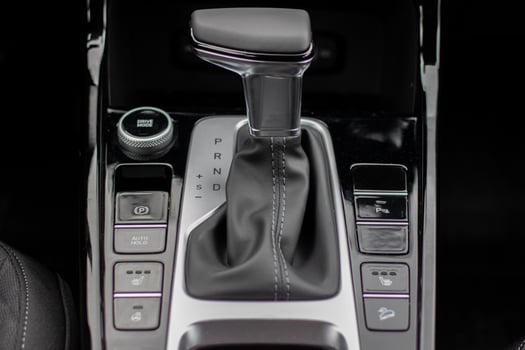 The interior of a new car. Automatic transmission in leather trim photo