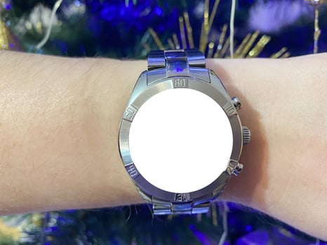 A view of the quartz watch dial with a stainless steel strap on the arm with a mockup photo