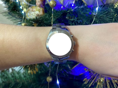 A view of the quartz watch dial with a stainless steel strap on the arm with a mockup photo