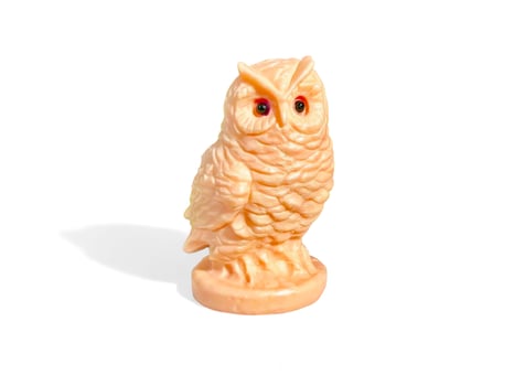 miniature owl decoration isolated on white photo