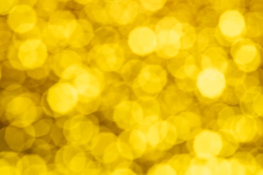 Gold abstract background with bokeh defocused lights photo