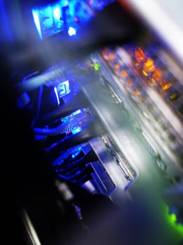 network cables connected to switch - closeup of data center hardware technology photo