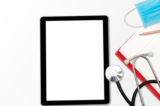 Stethoscope on medical table Healthcare and technology concept, tablet pc photo