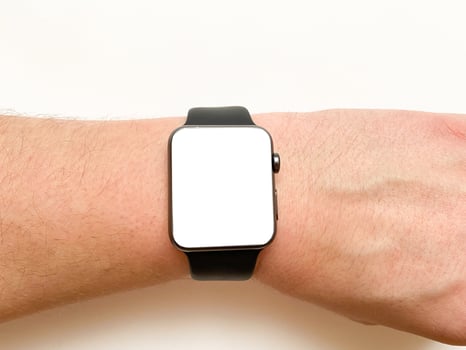 View of the smart watch screen on your hand with mockup on a white isolated background photo