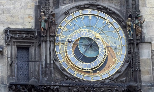 Medieval astronomical clock on the old town square in Prague photo