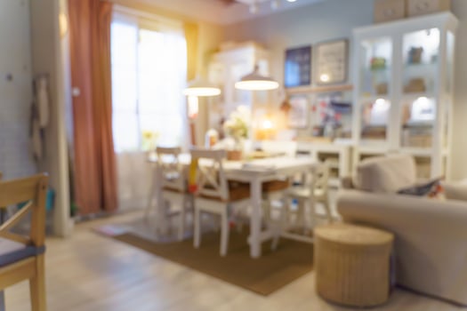 Defocused image of shop or cafe with bokeh coloful night lights background photo