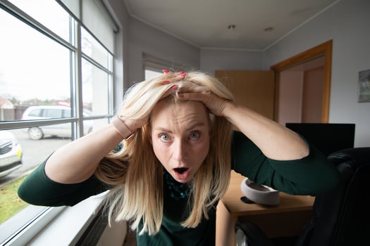 Desperate business woman in her office photo