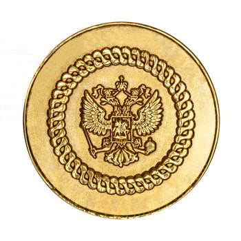 Russian coat of arms on the gold medal, isolated on a white background photo