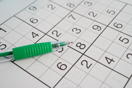 Sudoku puzzle, game to play for keep you brain younger for developing Alzheimer disease in senior patient. photo