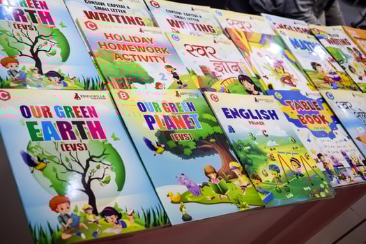 New Delhi, India, June 17 2024 - Variety of Books on shelf inside a book-stall at Delhi International Book Fair, Selection of books on display in Annual Book Fair at Bharat Mandapam complex photo
