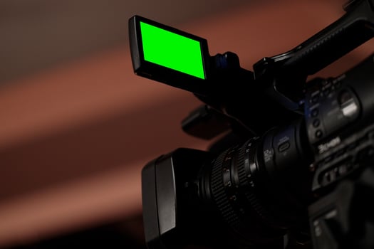 Close-up of Camera with Green Screen photo