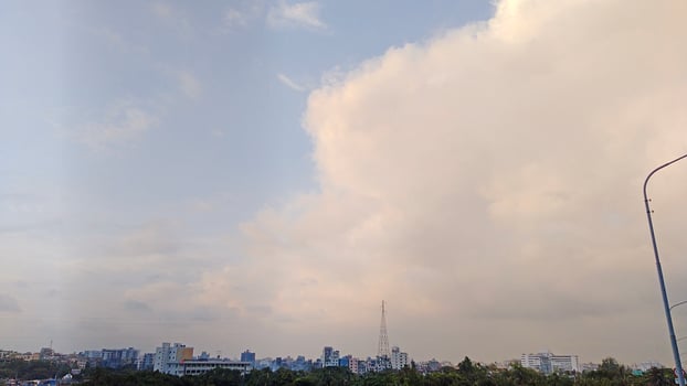 Beautiful scenery of colorful clouds reflecting in the river during sunset photo