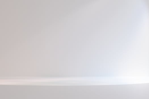 A white room with a white wall and a white floor. The room is empty and has a very clean and simple look. photo
