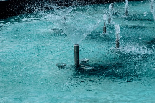 Texture of blue water in a fountain photo