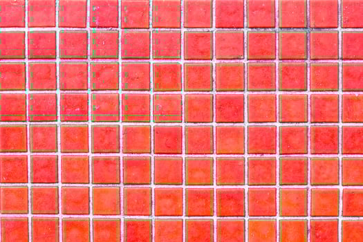 Texture of red mosaic tiles, close-up photo