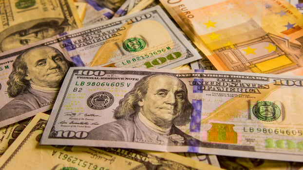 Background with money. US Dollar. American hundred-dollar bills. Euro banknote. One hundred dollars. Business concept photo