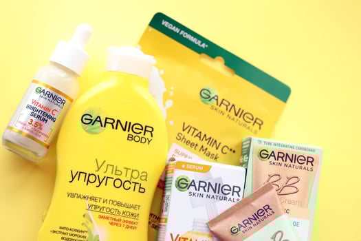 KYIV, UKRAINE - APRIL 20, 2024 Garnier production with company logo. Garnier is a mass market cosmetics brand of French cosmetics company L'Oreal photo
