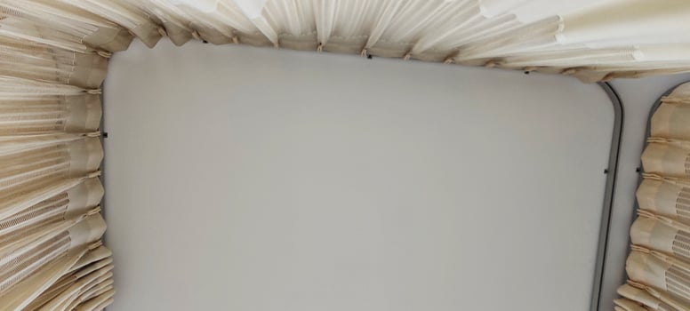 Background view of the ceiling of a hospital patient's room from the perspective of a bedridden patient. Clinical healthcare recovery treatment room ward. photo