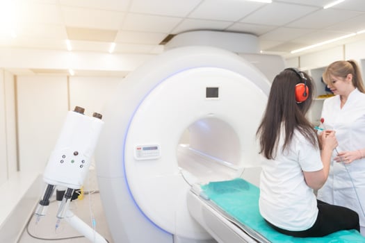 Medical CT or MRI Scan in the modern hospital laboratory. Interior of radiography department. Technologically advanced equipment in white room. Magnetic resonance diagnostics machine photo