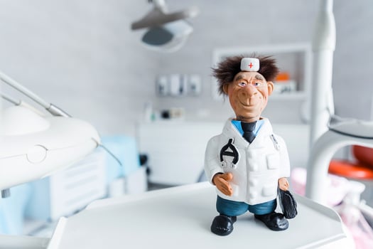 Quirky Doctor Figurine in Dental Clinic, Decor photo