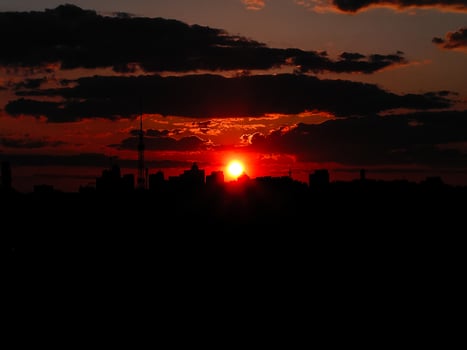 Autumn red sunset with a purple sky photo