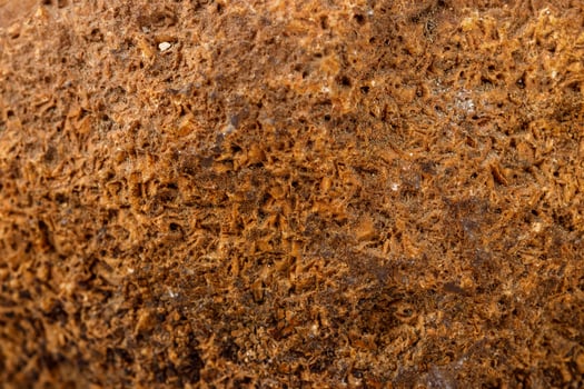 Macro mineral stone Agate Brown on white background photo