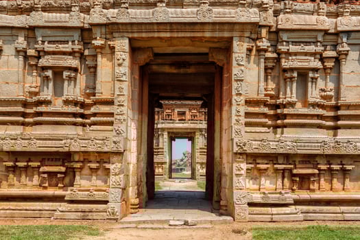 Gate in temple gopuram. Ruins in Hampi, Karnataka, India photo