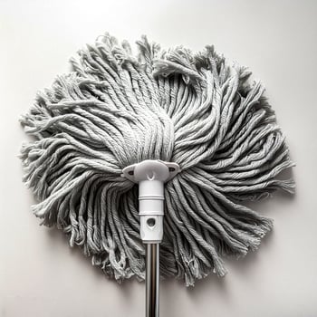 Top of view one mop on the white background photo