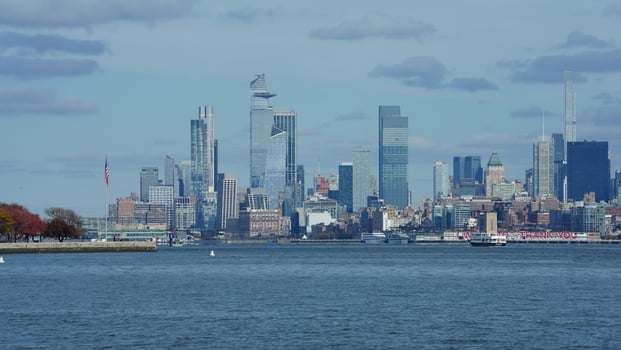 The New York manhattan view from the ferry boat in the sunny day photo