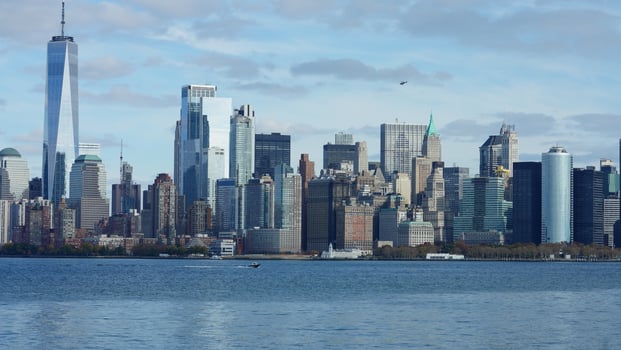 The New York manhattan view from the ferry boat in the sunny day photo