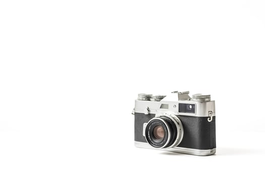 Vintage Silver Camera on White Background photo
