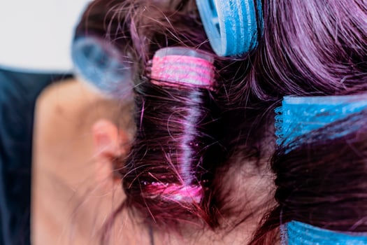 Curlers on hair, natural air drying, healthy lifestyle photo