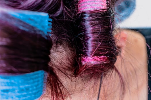 Curlers on hair, natural air drying, healthy lifestyle photo