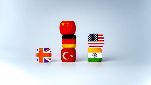 Screen printed USA flag and China flag on wooden cube, showing trade competition and tariff barriers, trade war between USA and China, global trade competition. photo