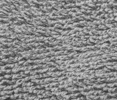 Blue fluffy cloth close view. Black and white monochrome grayscale photo background.